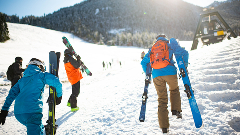 skiers take to the mountain