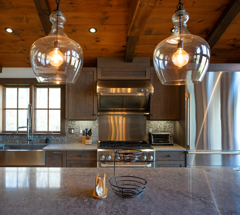 stylish gourmet kitchen with stainless steel appliances and granite countertops at 34 saw mill vacation rental at stratton mountain resort