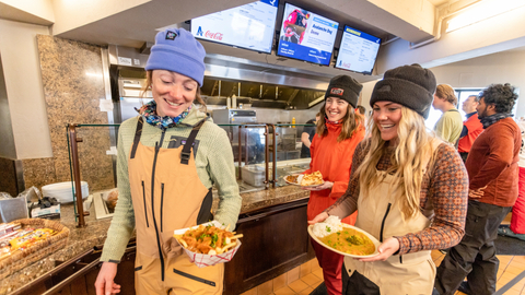 Three friends get lunch at Roundhouse Lodge at Solitude Mountain Resort. 