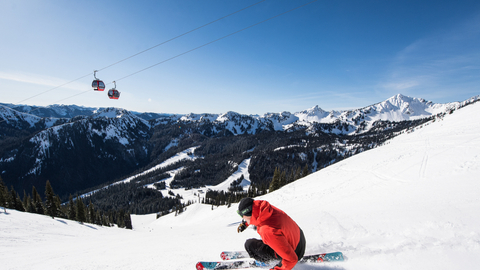 Skier turns on a groomer. 