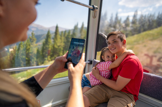 Two children on the Gondola at Winter Park