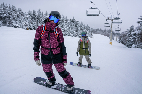 women riding snowboards during women’s snowboard lessons at stratton mountain resort