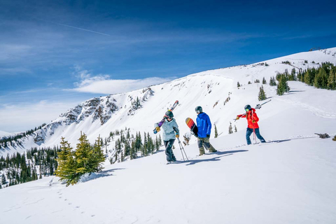 Three skiers in snow on top of Mary Jane at Winter Park Resort