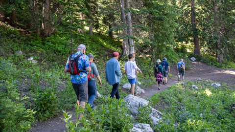 Group hiking to Lake Solitude while on a Geology Tour at Solitude Mountain Resort. 