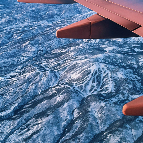 Southwest 737-800 airplane flying over Mt. Werner