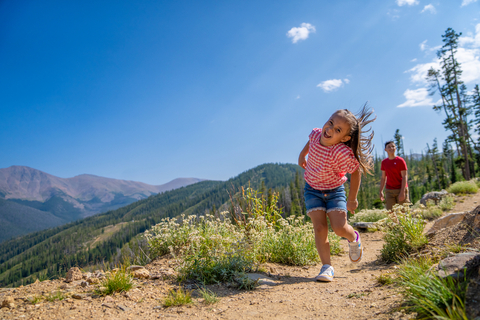 Kids hugging on Gondola at Winter Park