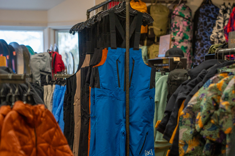 snowboarding bibs and snowboarding pants and puffy jackets for snowboarding at the burton stratton village shop
