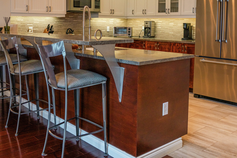 modern kitchen with stainless steel appliances at rising bear lodge vacation rental near stratton mountain