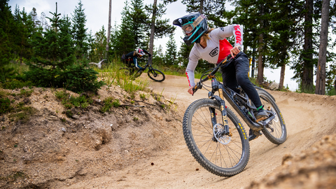 Two bikers on a berm at Trestle Bike Park Colorado