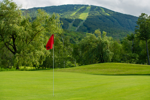 golf lifestyle course club boys friends guests smile laugh green apron pro shop music green fairway put drive chip
