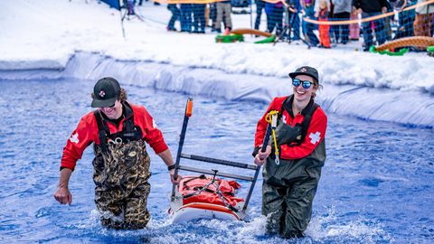 Guests participate in the Pond Skim Beach Party at Solitude Mountain Resort.