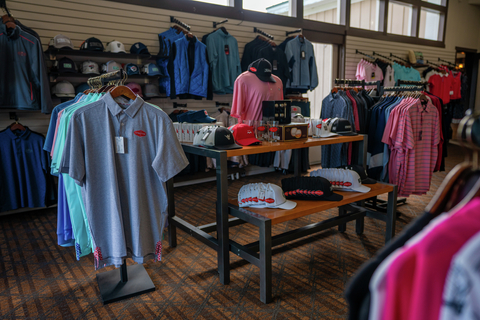 golf lifestyle course club boys friends guests smile laugh green apron pro shop music green fairway put drive chip
