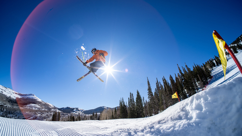 A skier catches big air in the Main Street Terrain Park at Solitude