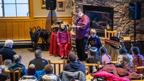 Guests enjoy the Torchlight Parade & Fireworks show at Solitude Mountain Resort. Before the fireworks an avalanche dog demo and magic show take place.