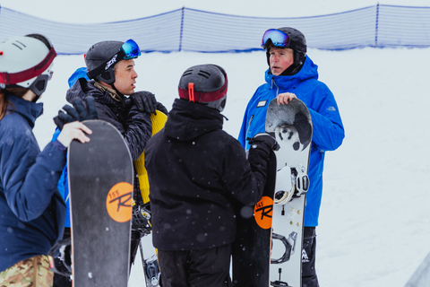 Crystal Mountain instructor teaches a group of snowboarders. 