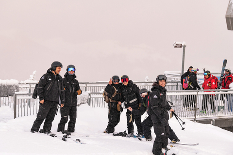 Crystal Mountain employees converse at the summit