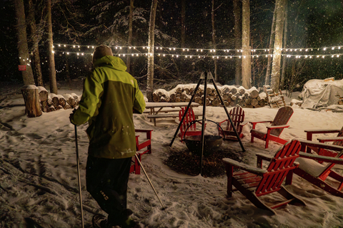 Man cross country skiing at night on light up nordic trails at Stratton Mountain