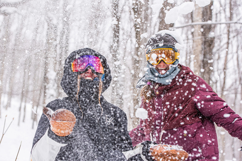 women enjoying a winter snow day during a women’s ski clinic at stratton mountain resort
