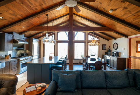 open concept great room with mountain views at 34 saw mill vacation rental at stratton mountain resort