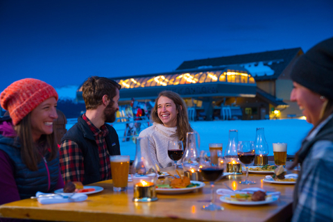 Group eating dinner mountaintop at Winter Park Resort