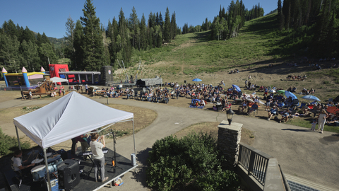 A band plays in front of a crowd at Moonbeam during Solitude Mountain Resort's Sunday Live Music Series