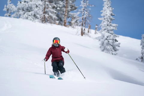 Female Skier in Deep Powder