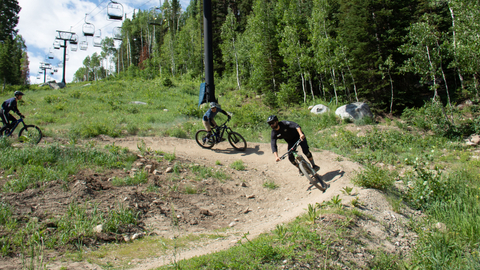 Instructor teaching mountain bikers in a clinic at Solitude Bike Park. 