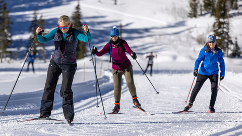 Skiers Nordic skate ski at the Solitude Nordic & Snowshoe Center