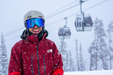Man laughing in snow storm at Winter Park Resort