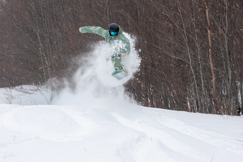 snowboarder riding down the trail and Purchase lift tickets at stratton mountain resort