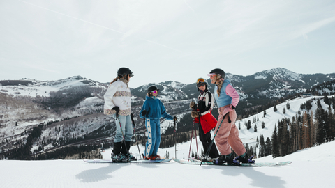 Friends spring ski while staying at Solitude Mountain Resort. 