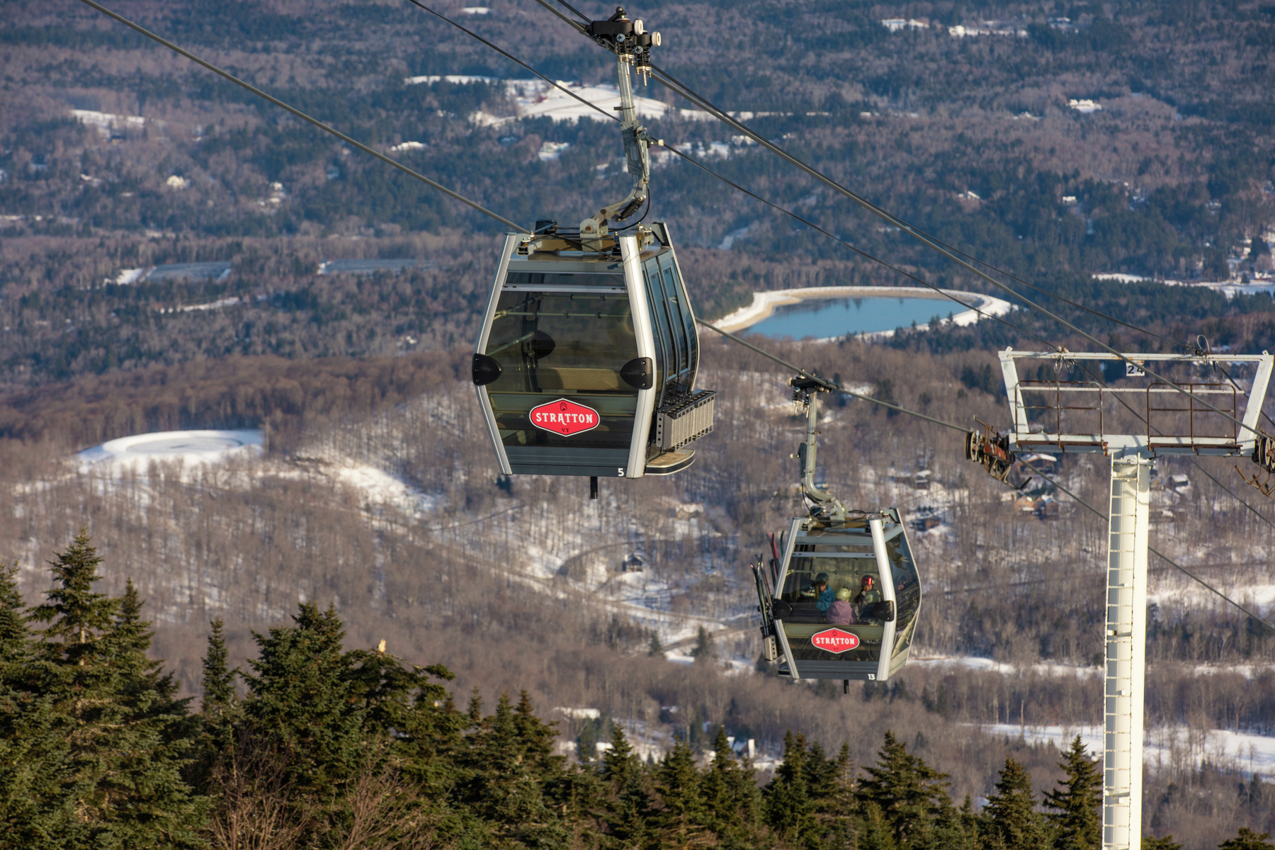 sunny sunday employee ski school scenic summit views ski butlers waffle cabin guests skiers snowboarders