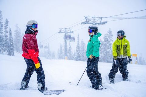 Skier and snowboarders on mountain at Winter Park Resort during a snow storm