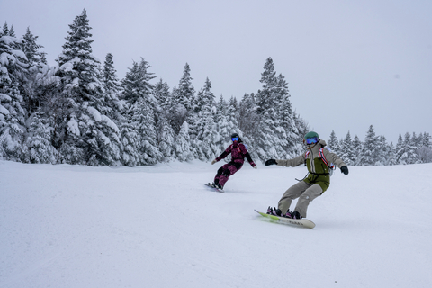 Women Snowboarding in The North Face