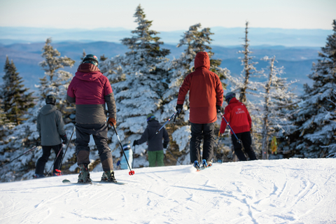 sunny sunday employee ski school scenic summit views ski butlers waffle cabin guests skiers snowboarders