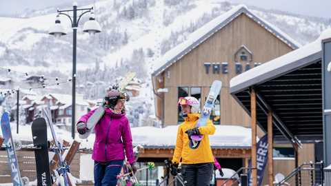 skiers at base exterior range