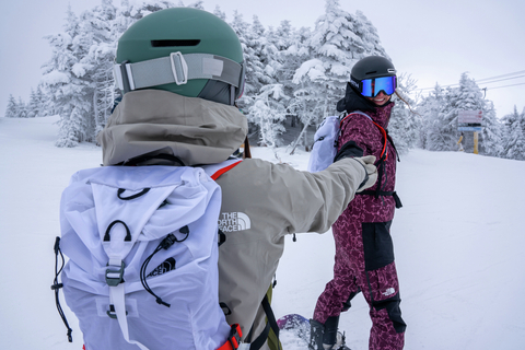 Women Snowboarding in The North Face