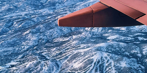 Southwest 737-800 airplane flying over Mt. Werner