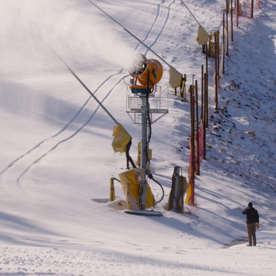 snowguns and drone wide cat snow snowmaking dramatic scenic