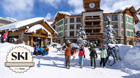 A family staying at Solitude Mountain Resort walks out to the lift on their way to ski.