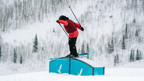 A freestyle skier jibs the terrain park at Solitude Mountain Resort.