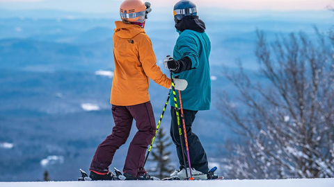 Skiers looking at a view at Stratton Mountain