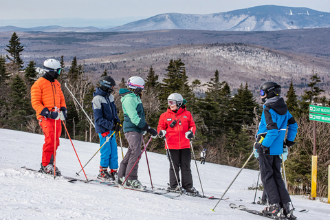 A group of skiers learning to ski in stratton's Learn To Ski and Learn to Snowboard program