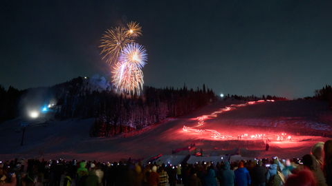 Guests enjoy the Torchlight Parade & Fireworks Show at Solitude Mountain Resort on New Year's Eve.