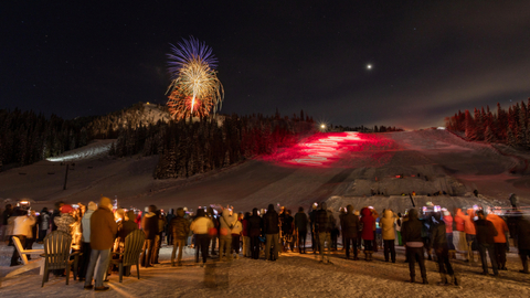 Guests enjoy the Torchlight Parade & Fireworks Show at Solitude Mountain Resort.