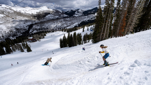 Three friends spring ski the wiggle at Solitude Mountain Resort.