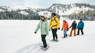 Friends enjoy snowshoeing at the Solitude Nordic Center.