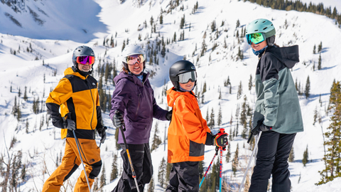 A family skiing together at Solitude Mountain Resort