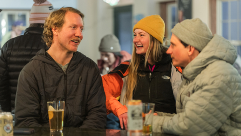 Friends enjoy après at The Thirsty Squirrel at Solitude Mountain Resort.