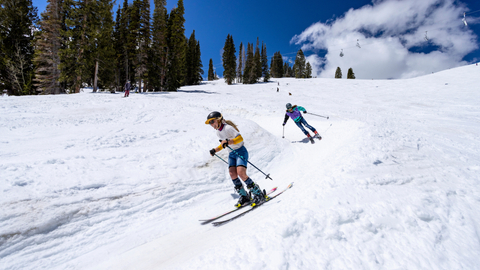 Two friends spring ski the wiggle at Solitude Mountain Resort.